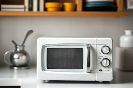 Compact microwave oven on kitchen counter